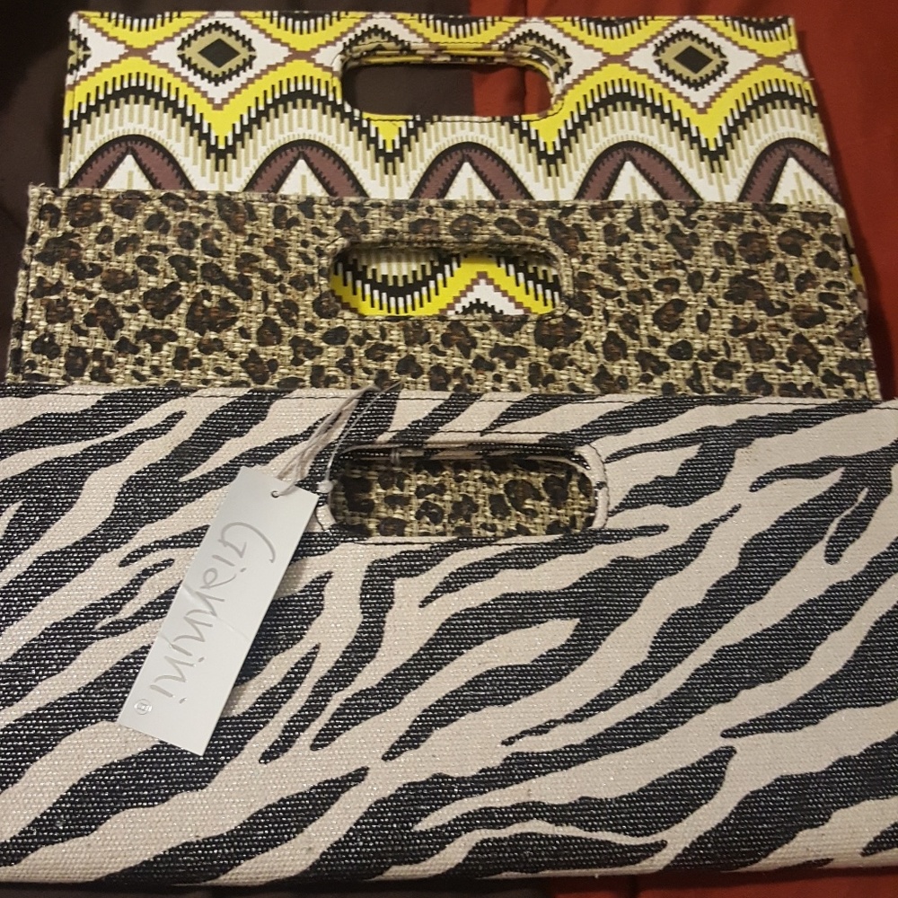 Total of three clutch bags